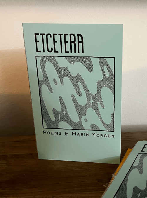 A zine titled Etcetera, with an illustration of stars in a swirling mist